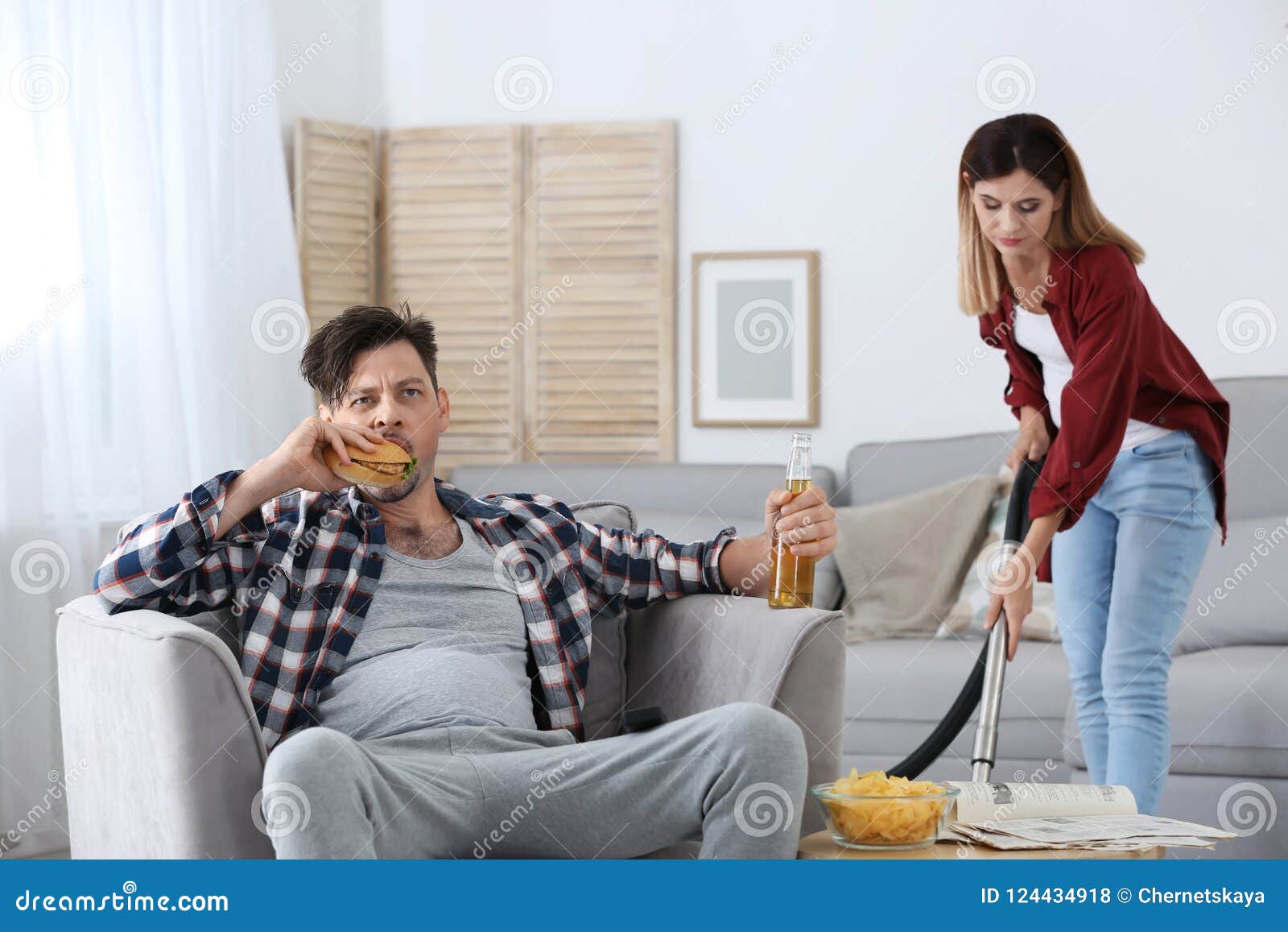 Husband Watches His Wife Telegraph 