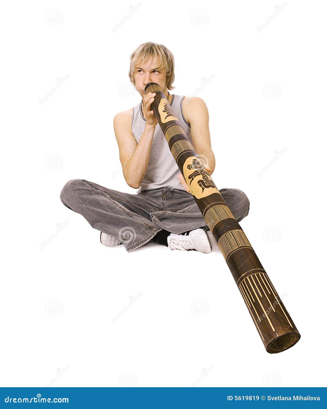 Le Didgeridoo De Jeu Du Type Image stock Image du découpage