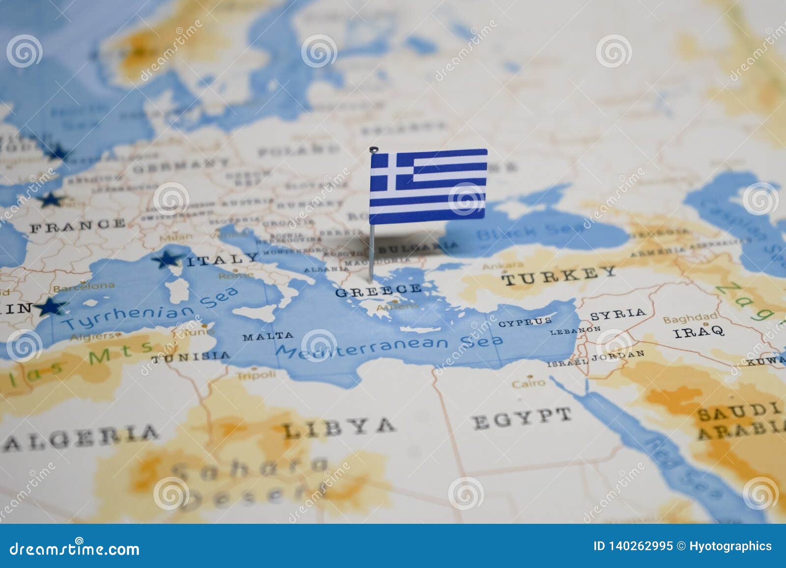 Le Drapeau De La Grèce Dans La Carte Du Monde Image Stock