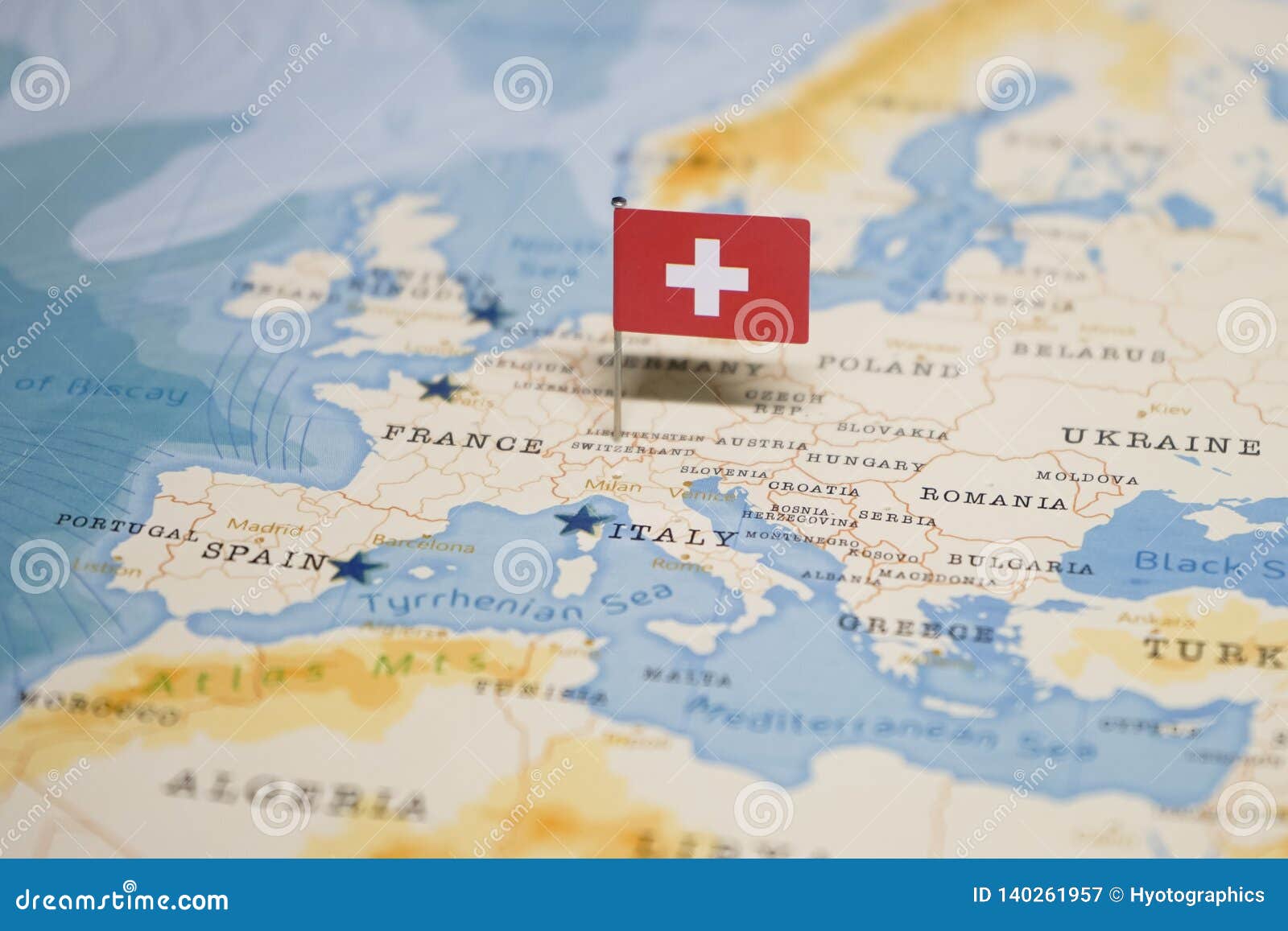 Le Drapeau Du Suisse Dans La Carte Du Monde Image Stock