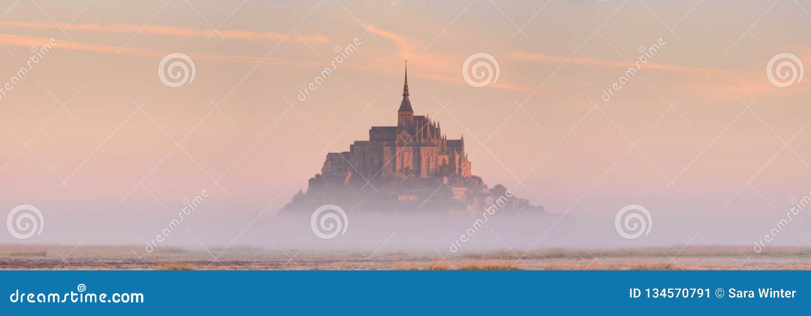 le mont saint michel in normandy, france at sunrise