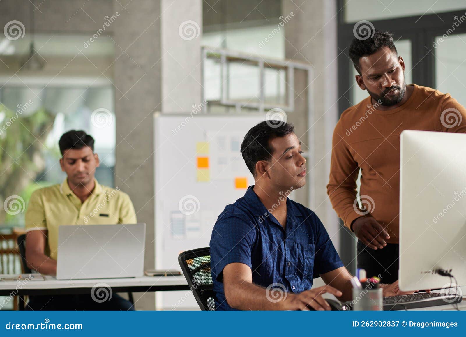 Lead UX Designer Helping Colleague Stock Image Image of businessman