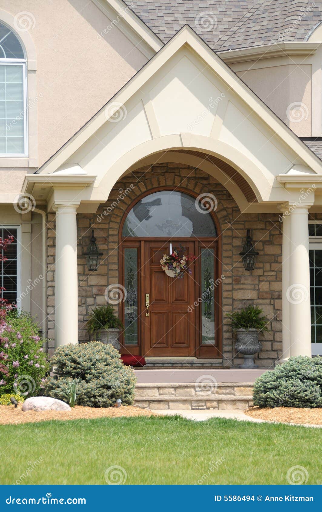 Exterior View Of The Open Front Door To A Residence With The