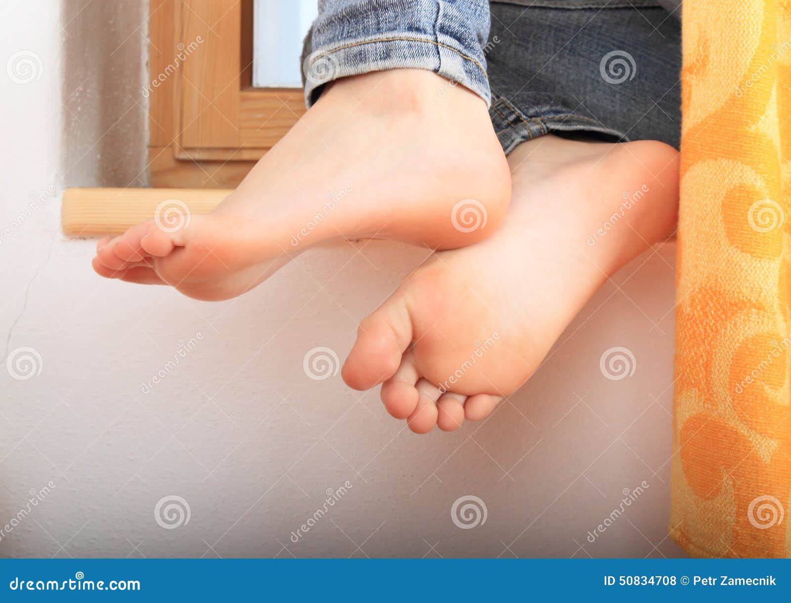 leaning bare feet