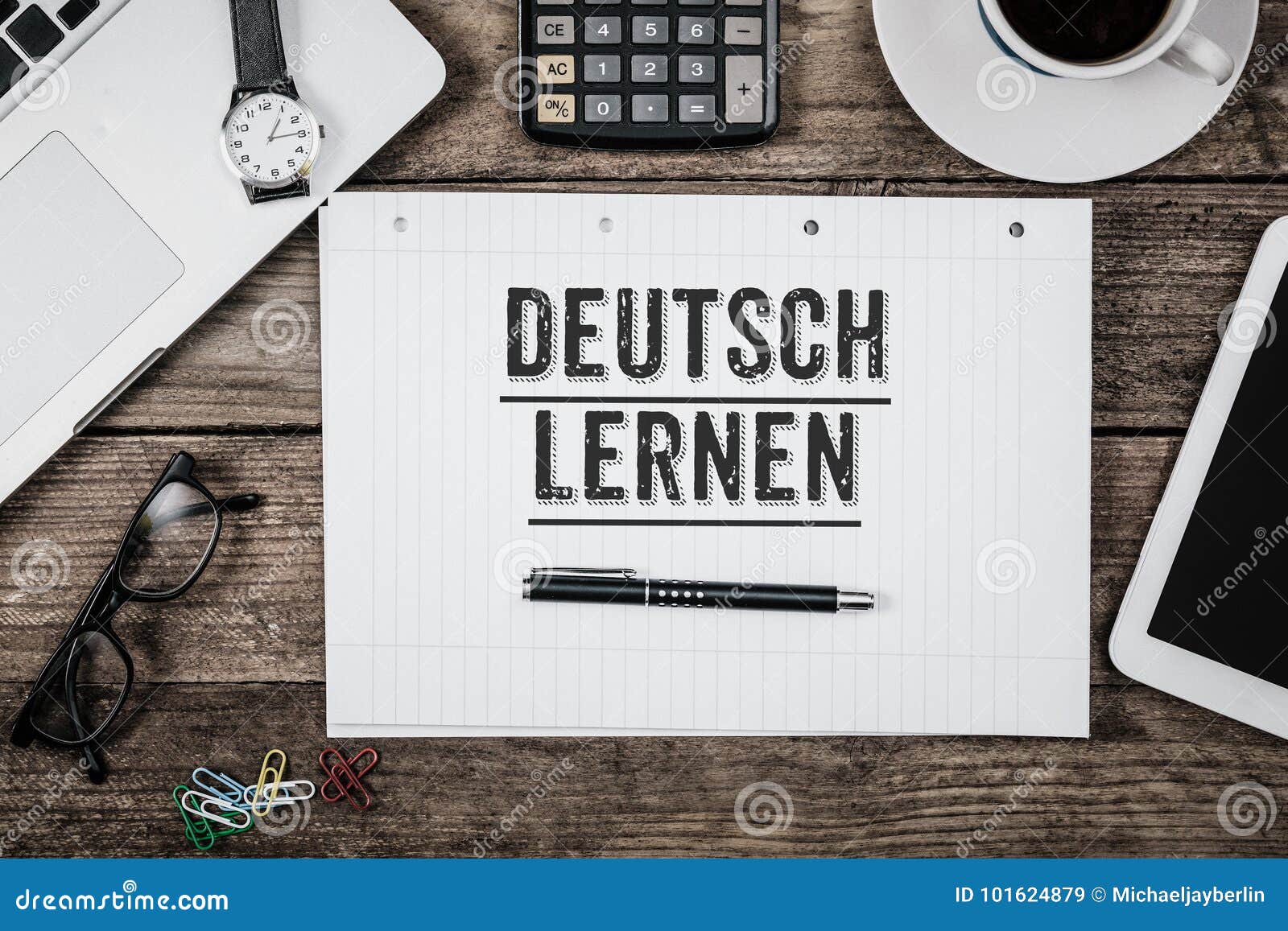 Learn German On Notepade At Office Desk With Computer Technology