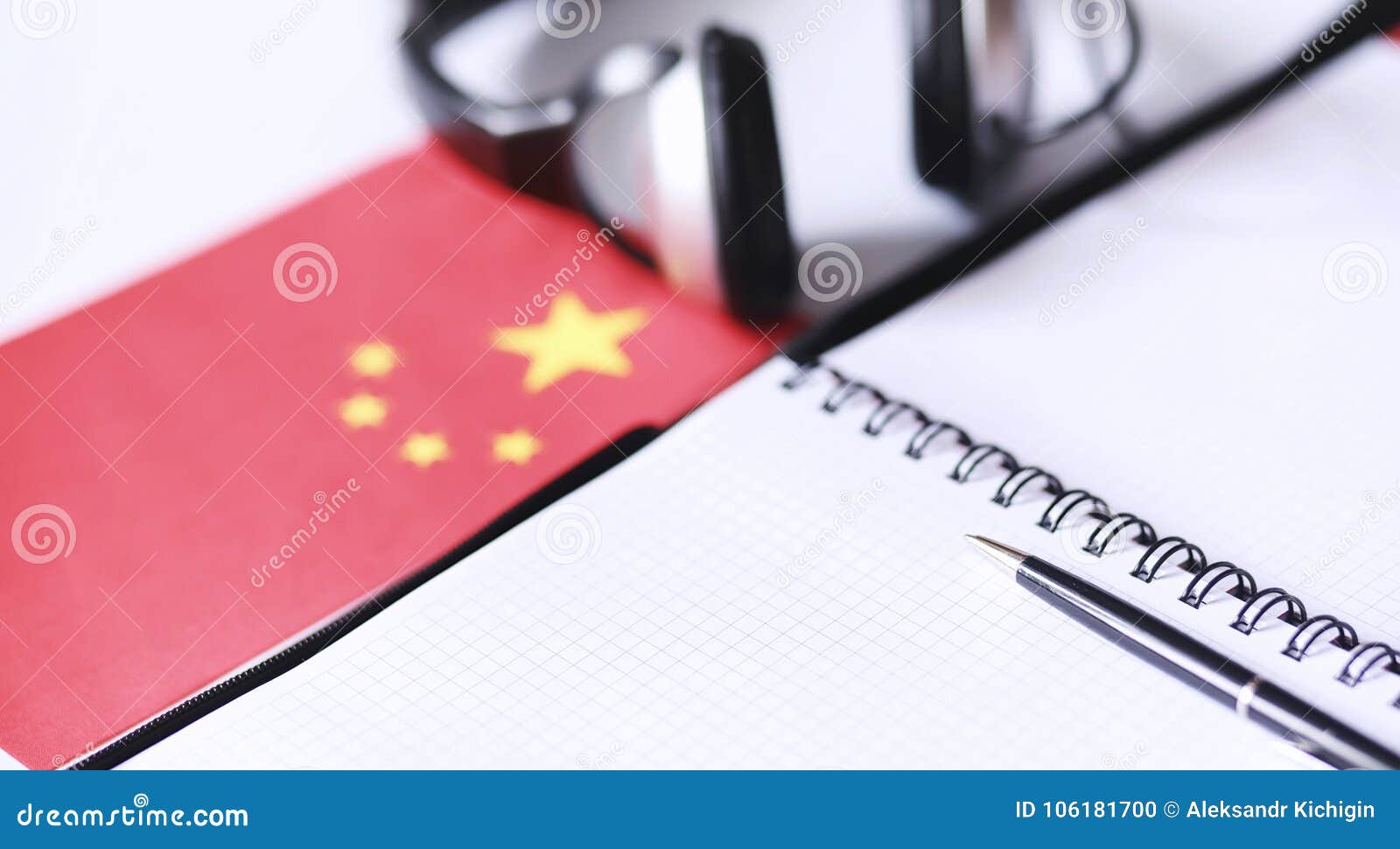 Learning Foreign Languages. Notepad for Entries and a Flag Stock Photo