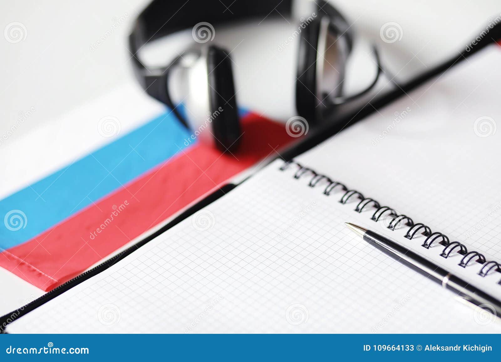 Learning Foreign Languages. Notepad for Entries and a Flag Stock Image