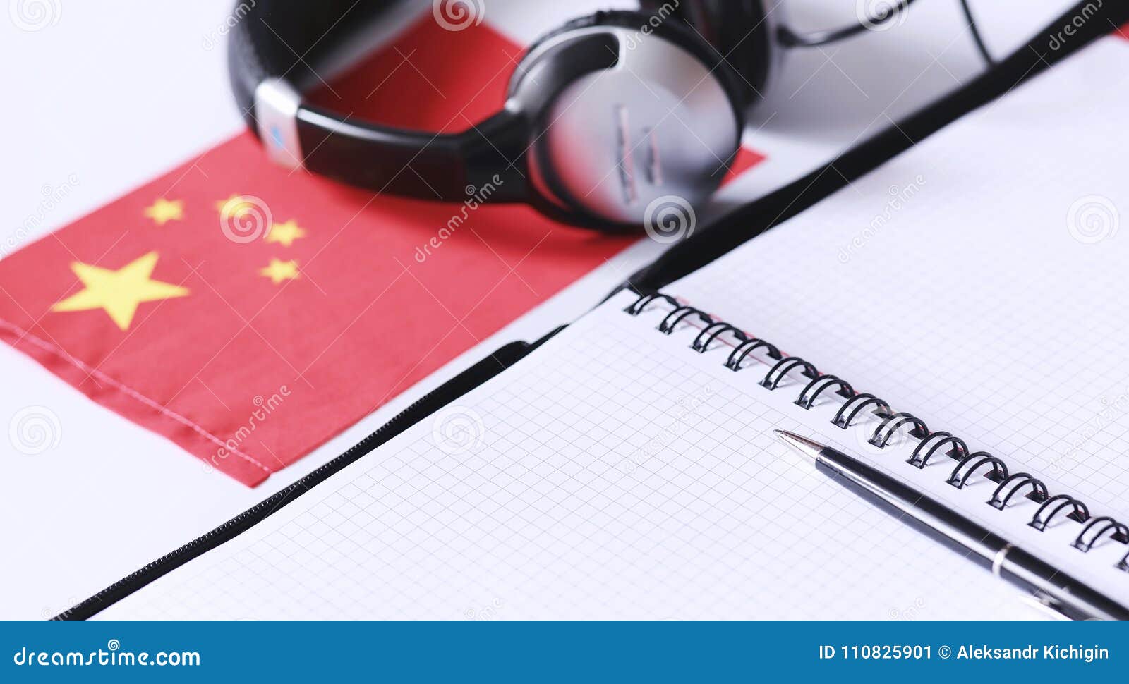 Learning Foreign Languages. Notepad for Entries and a Flag Stock Image