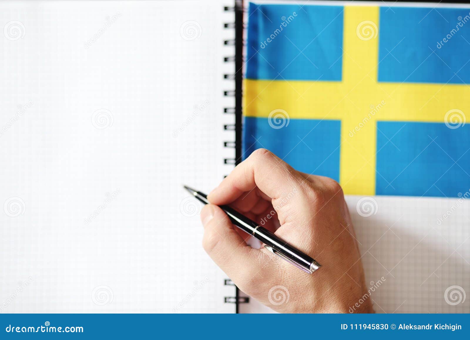 Learning Foreign Languages. Notepad for Entries and a Flag Stock Photo
