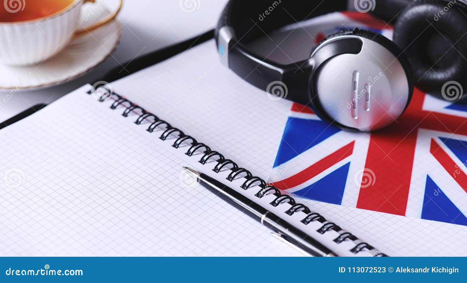 Learning Foreign Languages. Notepad for Entries and a Flag Stock Image
