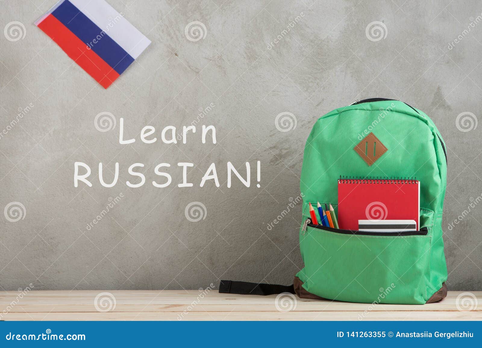 Backpack, Flag of the Russia, Chancellery and Notebooks Against a