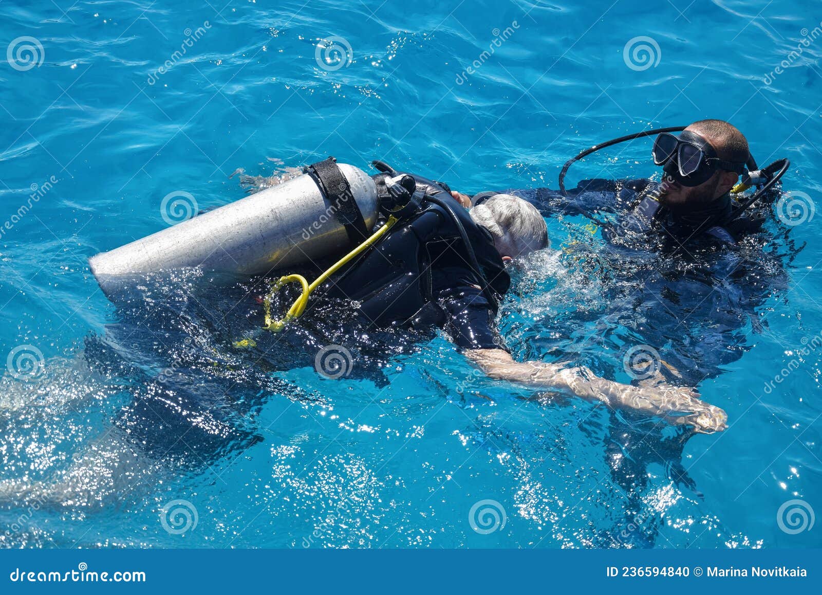 Learning Process of Scuba Diving. Experienced Instructor Teaches