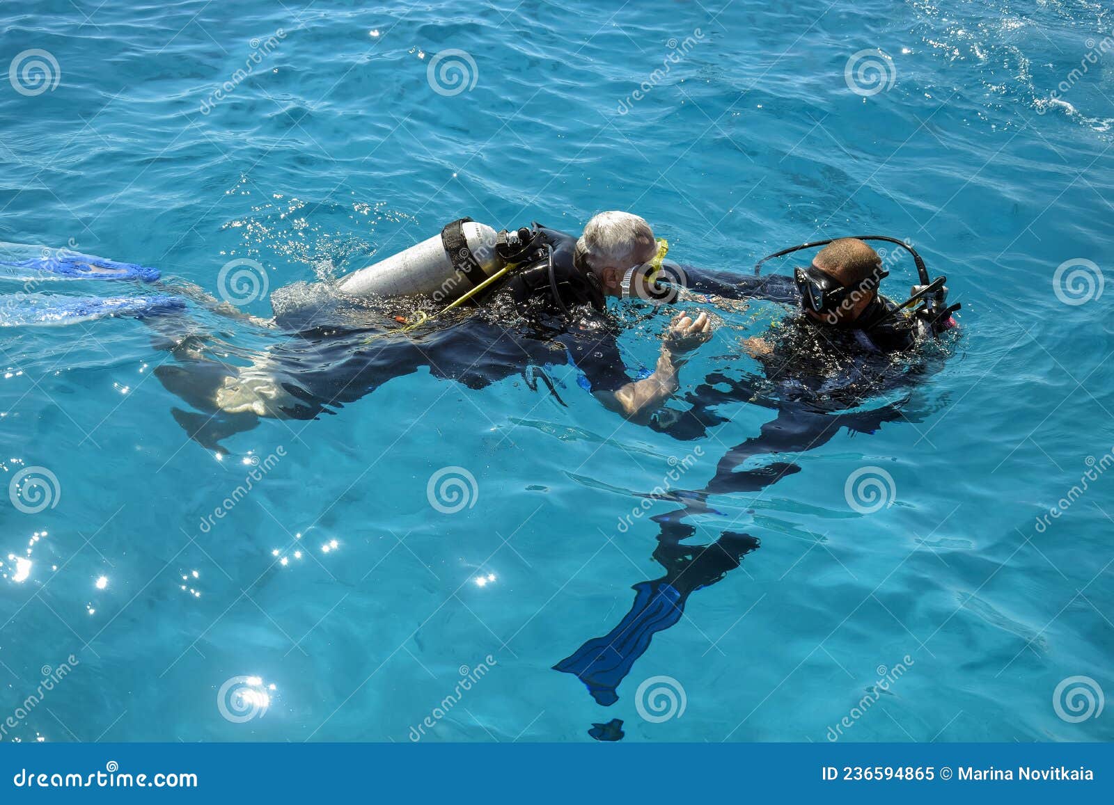 Learning Process of Scuba Diving. Experienced Instructor Teaches