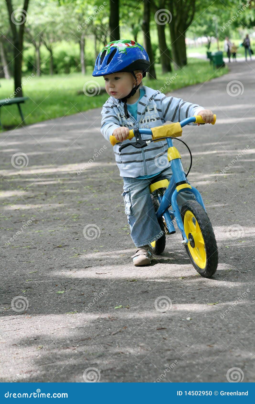 Learning To Ride on a First Bike Stock Photo Image of helmet, bike