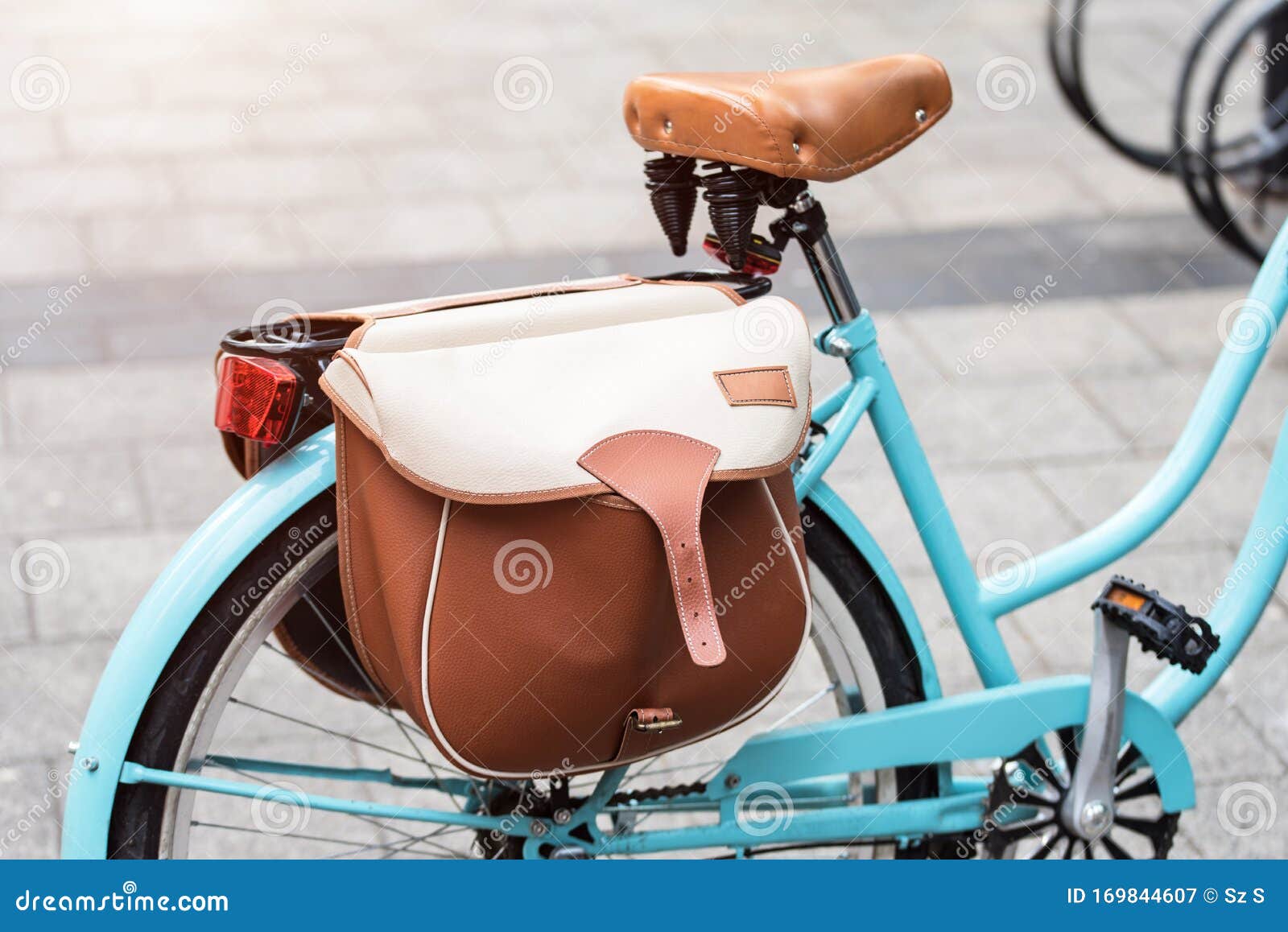 Leather bag on the bicycle stock image. Image of casual - 169844607