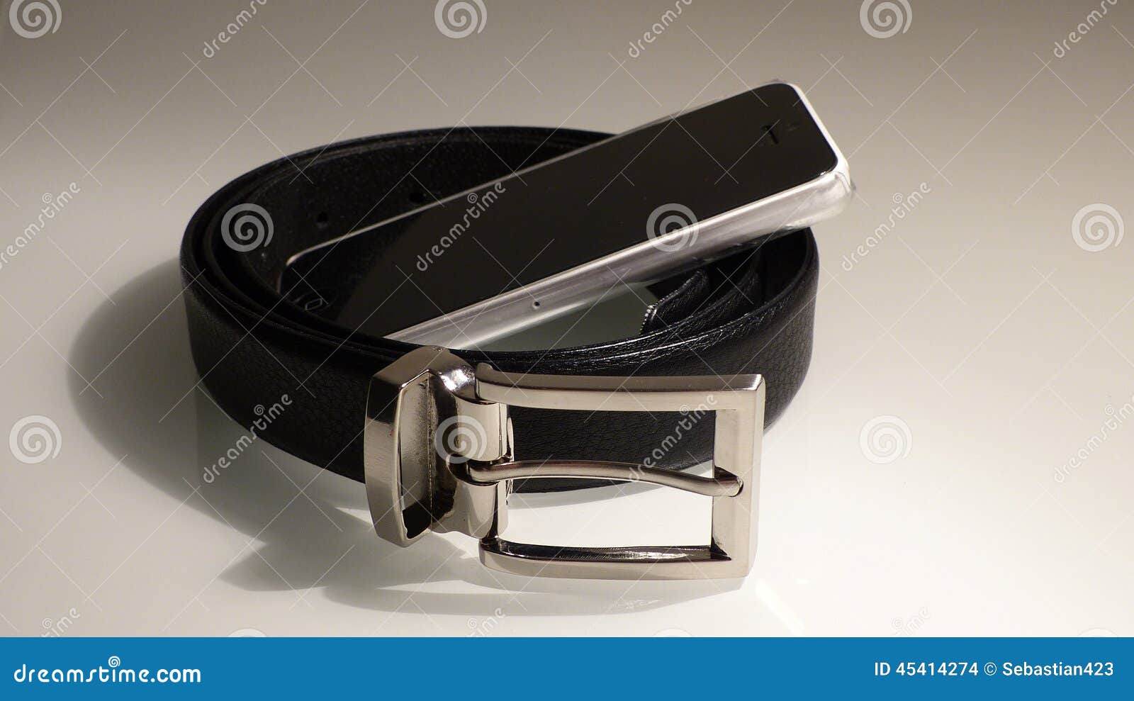 Leather belt with phone stock photo. Image of business 45414274