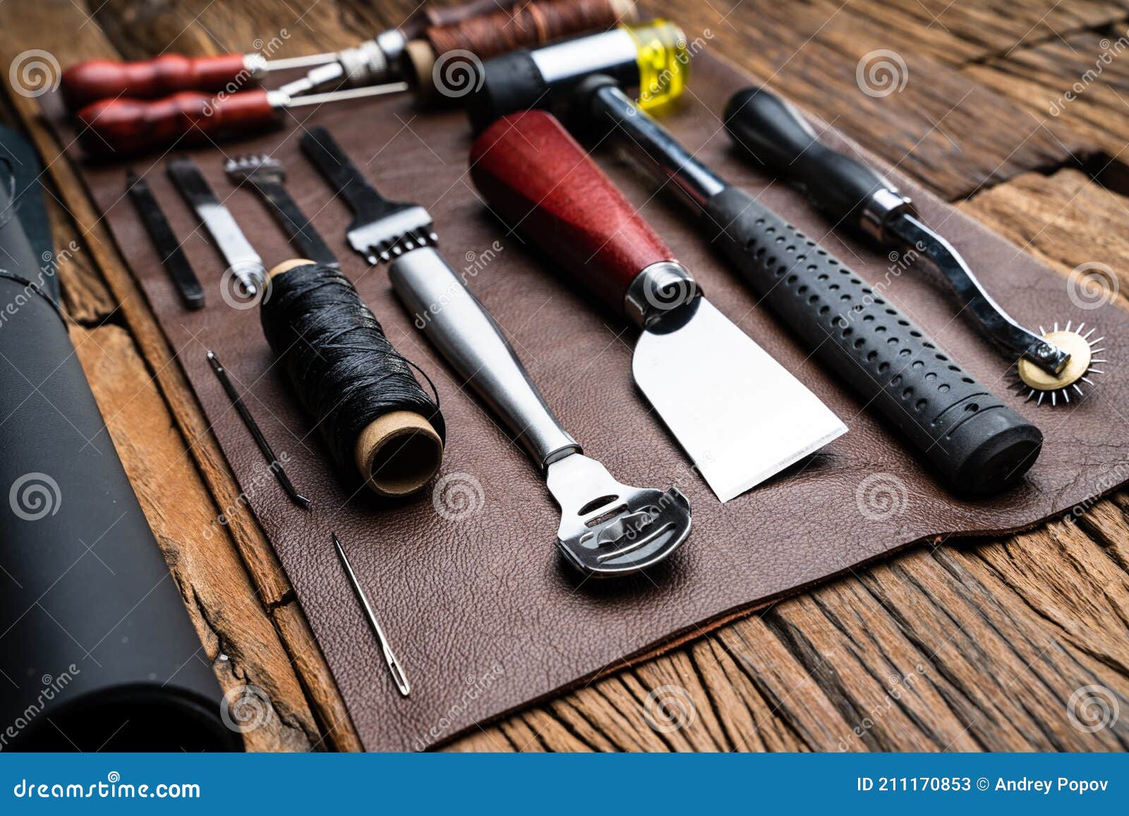 https://thumbs.dreamstime.com/z/leather-craft-tools-desk-leather-craft-tools-desk-tailoring-workshop-211170853.jpg