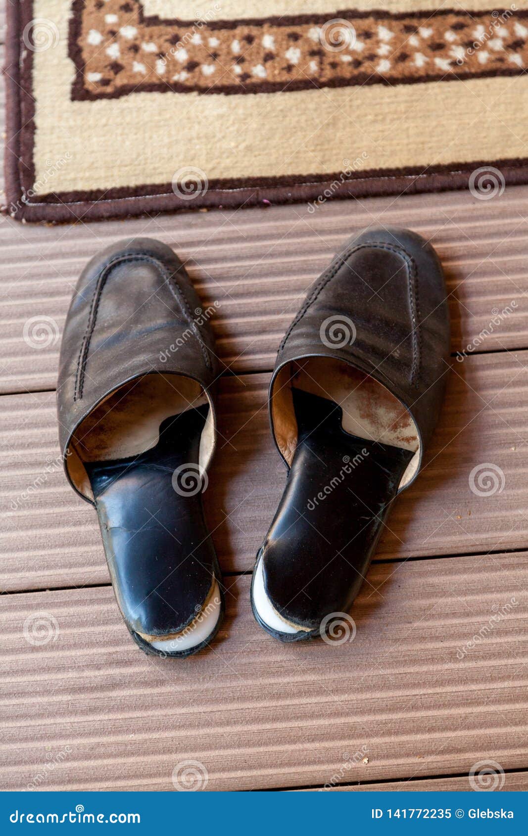 Leather Slippers Stand in Front of Carpet Stock Image - Image of ...