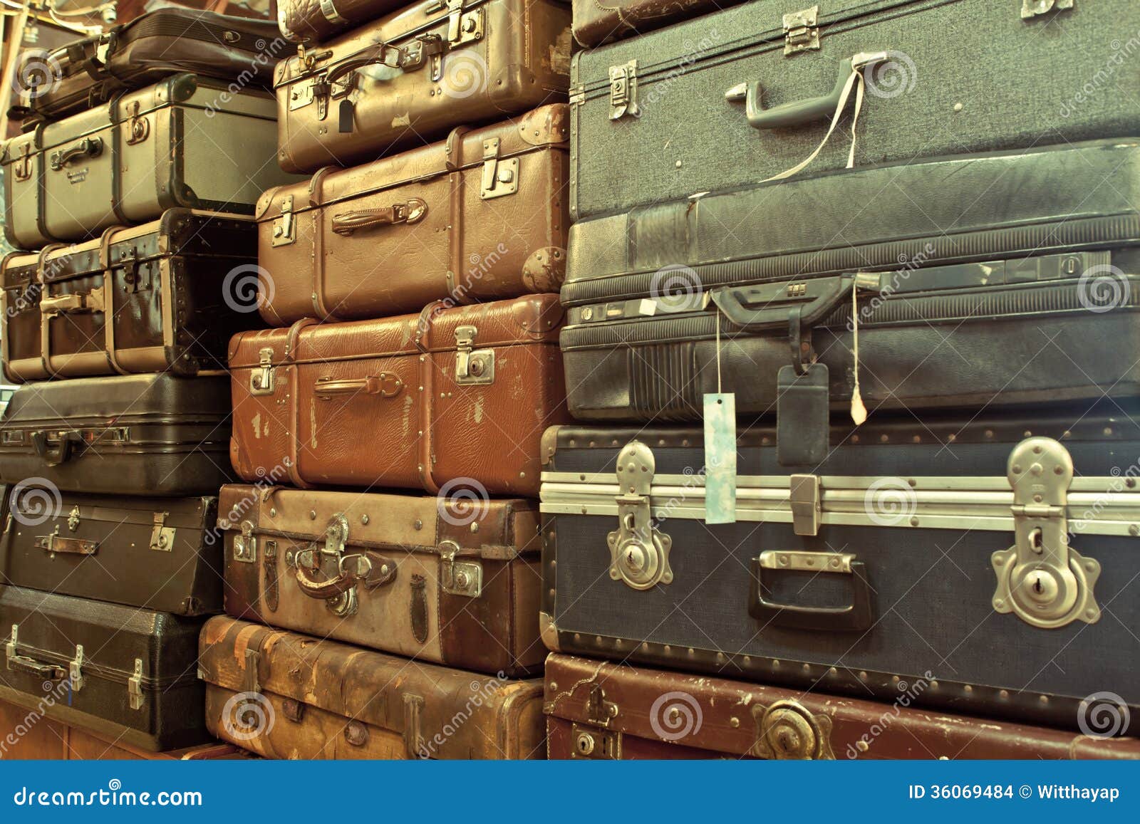 Leather suitcases stacked stock photo. Image of trip 36069484