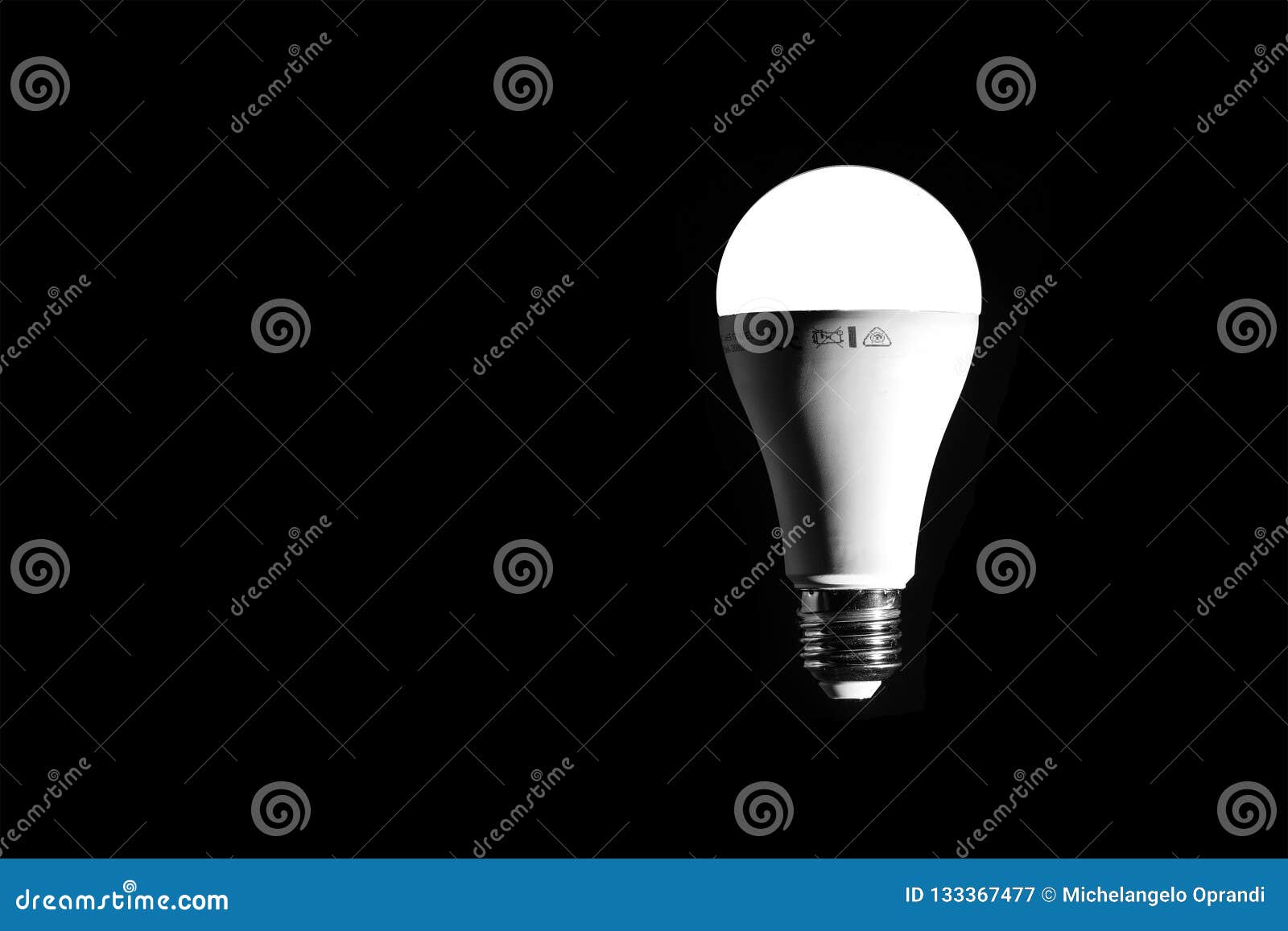 LED Light Bulb Lit on a Black Background Stock Image Image of
