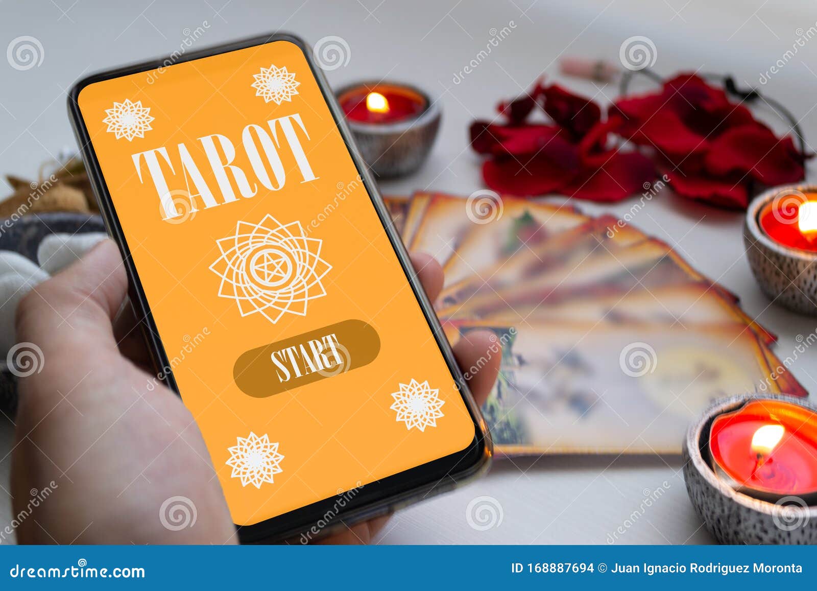 Left Hand Holding Smartphone with Tarot App, with Cards and Different Mystical Divination Objects Out Focus Stock - Image of card, screen: 168887694
