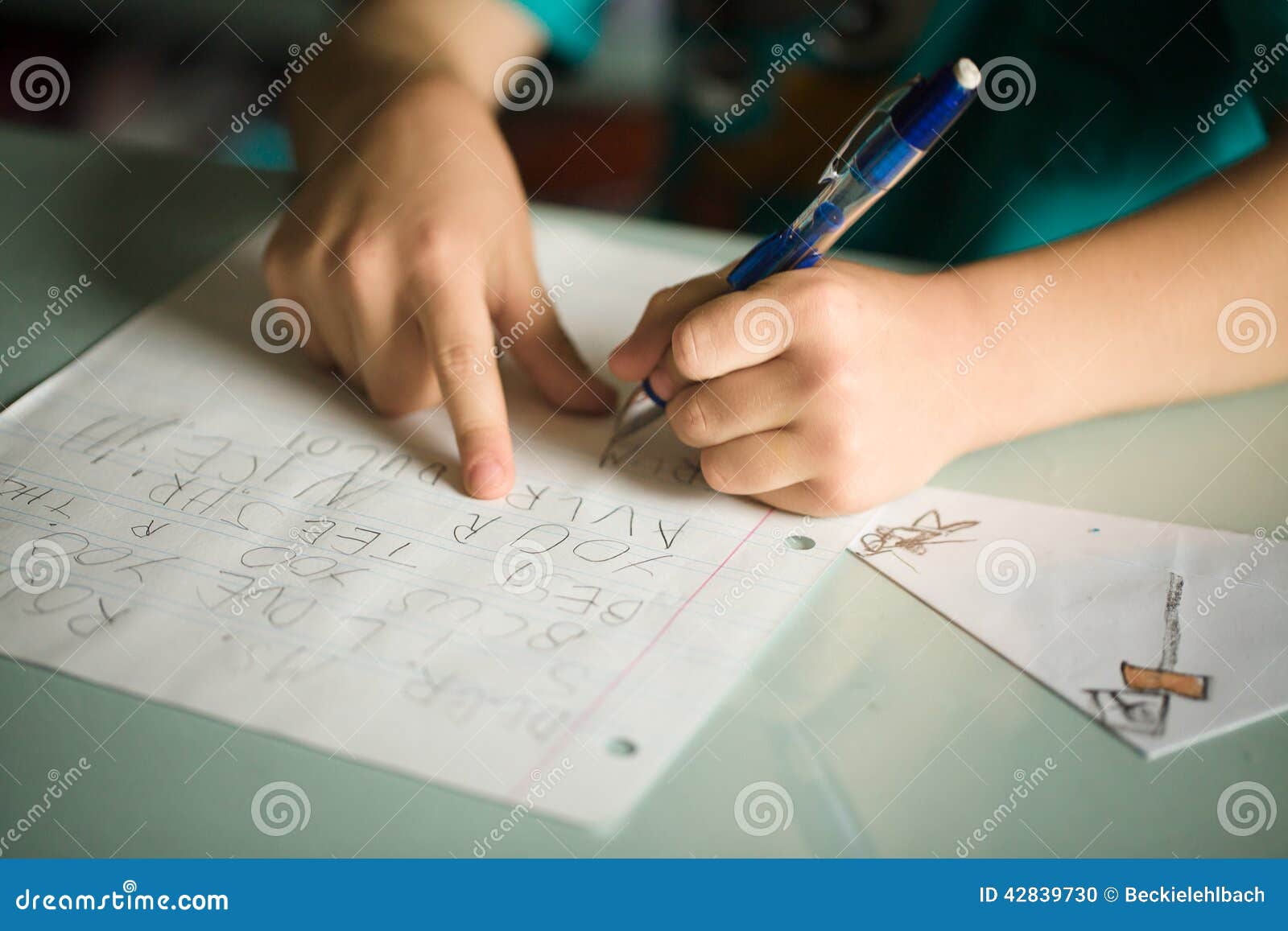 left handed boy writing