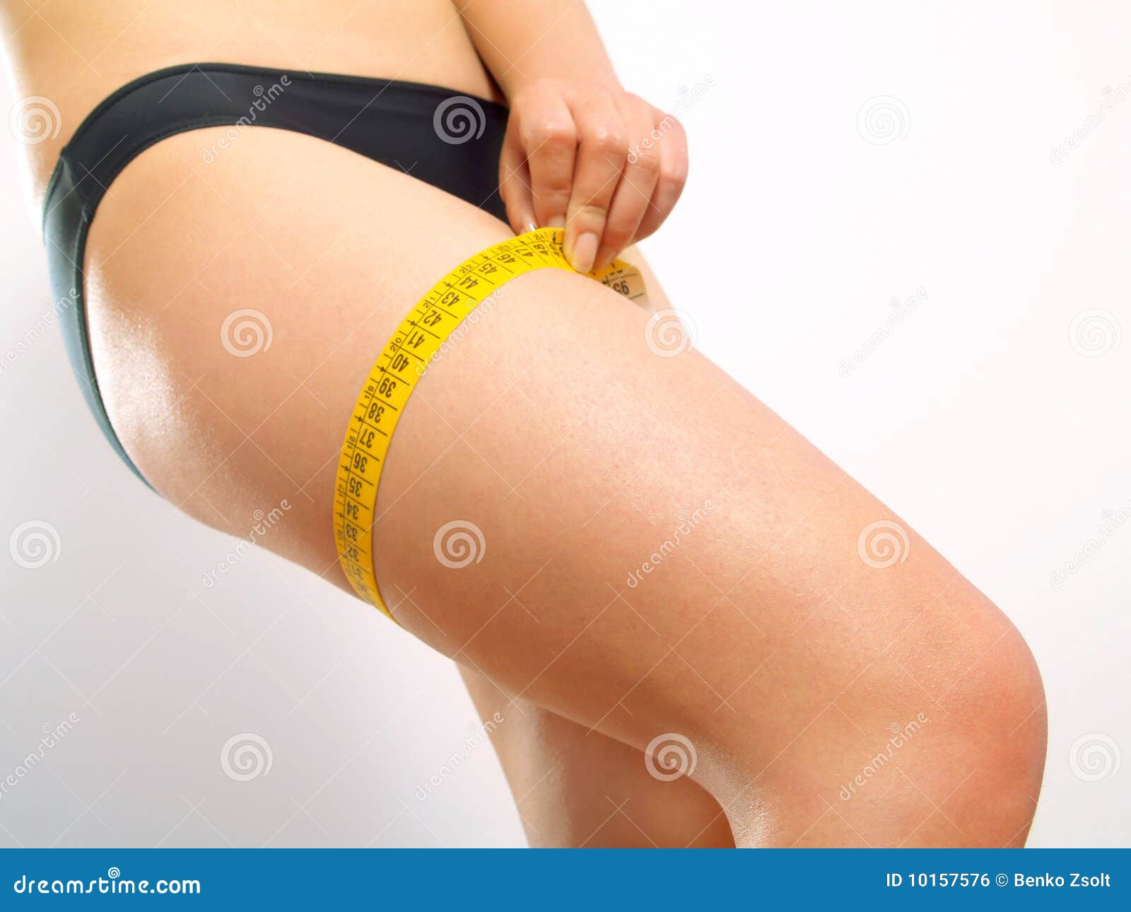 Leg with tape measure stock photo. Image of cellulite 10157576