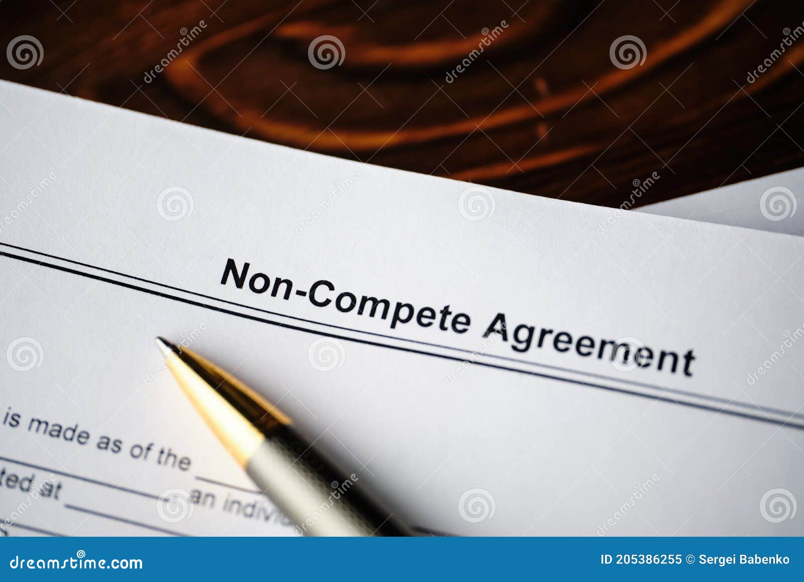 legal document non-compete agreement on paper close up
