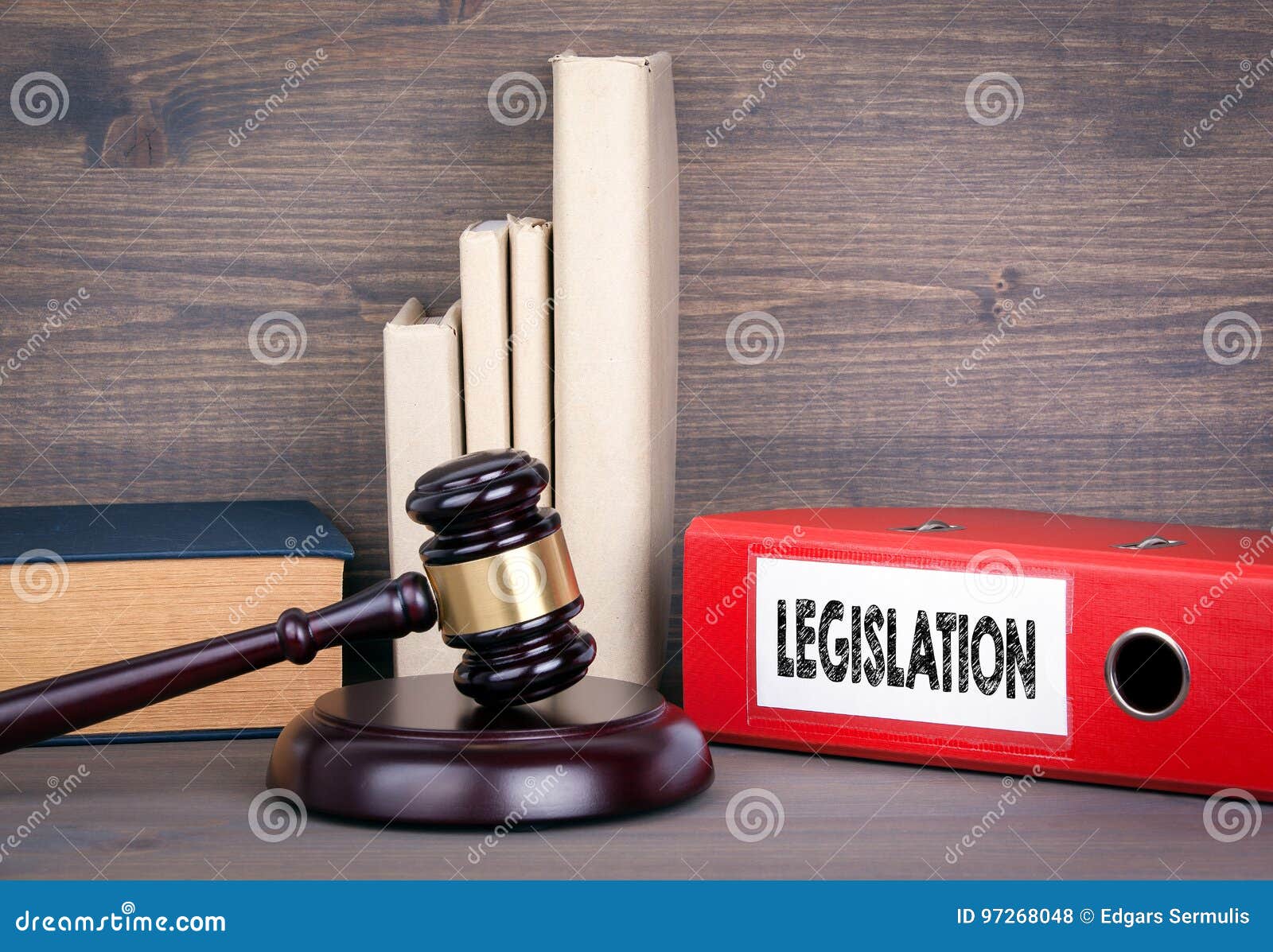legislation. wooden gavel and books in background. law and justice concept