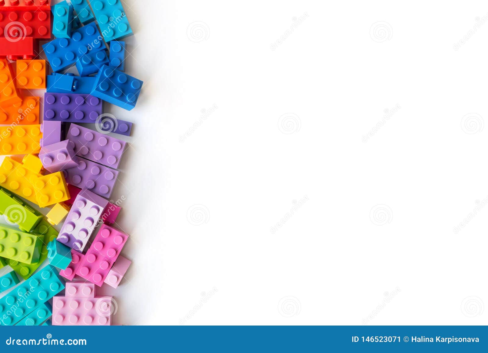 lego bricks background. a lot of colorful plastick constructor bricks on white background. popular toys. copyspace
