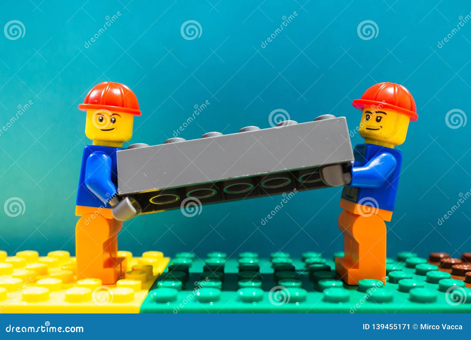 Lego Construction Workers Editorial Photo Image Of Construction 139455171 Enjoy the hd lego, cartoon, art clipart. https www dreamstime com lego construction workers poznan poland february two helmet lifting together as team gray plastic brick teamwork very image139455171