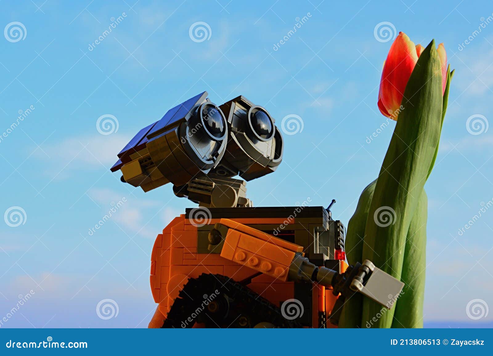 LEGO Wall-E Robot Figure from Pixar Animated Movie Holding Spring Orange To Yellow Tulip Flower, Blue Skies in Background Editorial Stock Photo - Image of gardening, skies: 213806513 LEGO Wall-E Robot Figure from Pixar Animated Movie Holding Spring Orange To Yellow Tulip Flower, Blue Skies in Background Editorial Stock Photo - Image of gardening, skies: 213806513