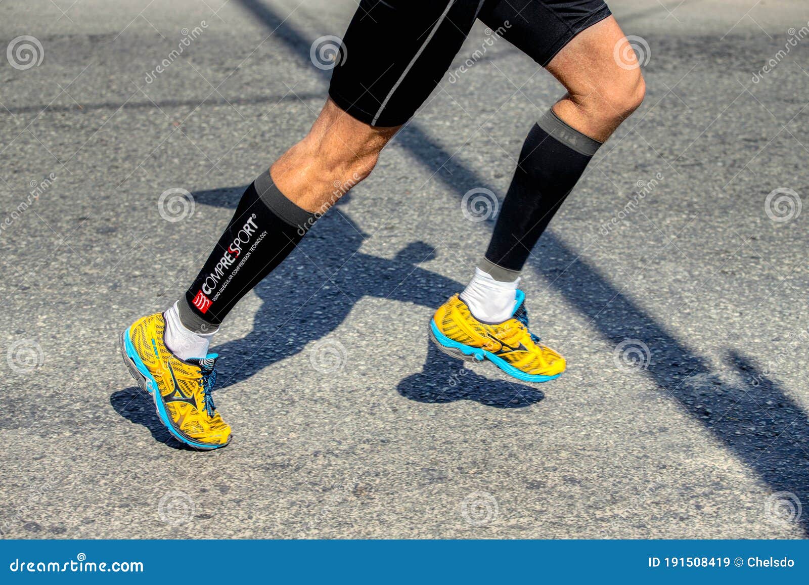 Legs Man Runner in Running Shoes Mizuno Editorial Stock Image - Image ...