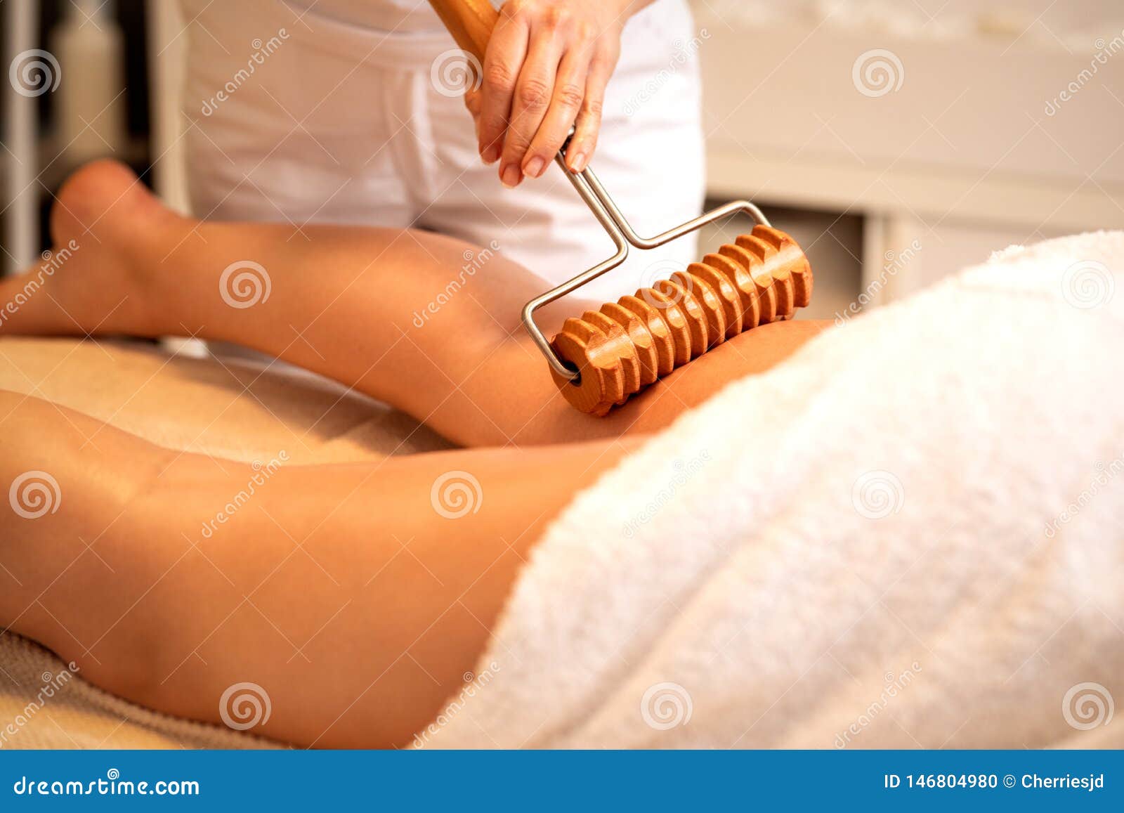Legs Massage With Rolling Pin In Beauty Spa Salon Stock