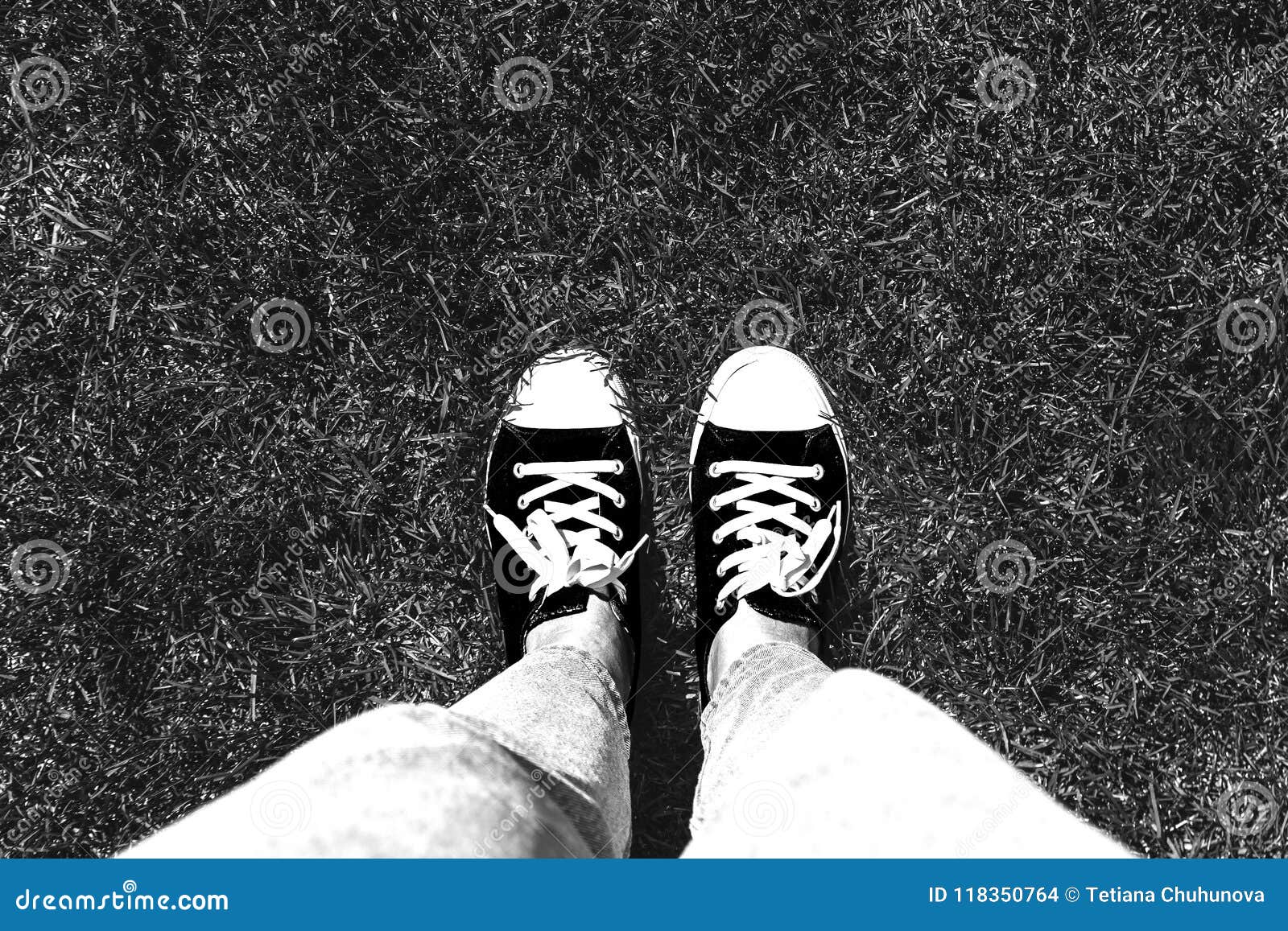 Legs in Old Sneakers on Grass. View from Above Stock Photo - Image of ...