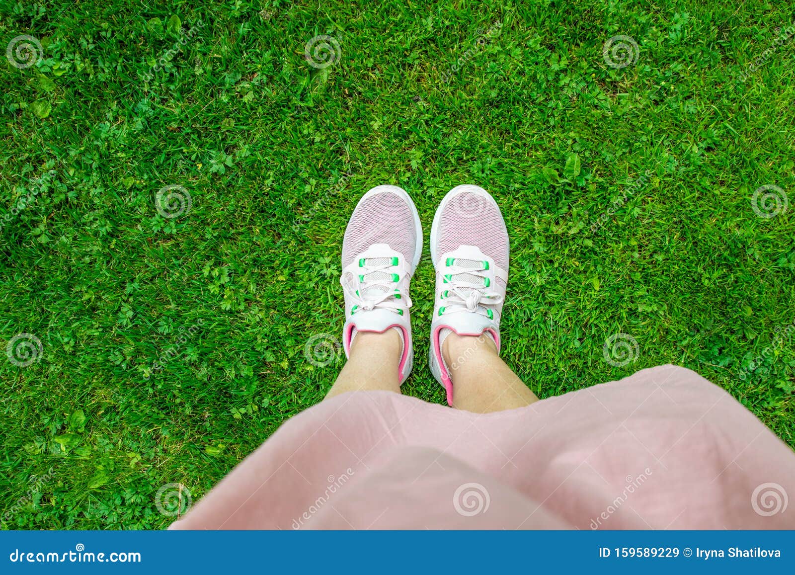 Legs in Pink Sneakers on Green Grass Stock Image - Image of beautiful ...