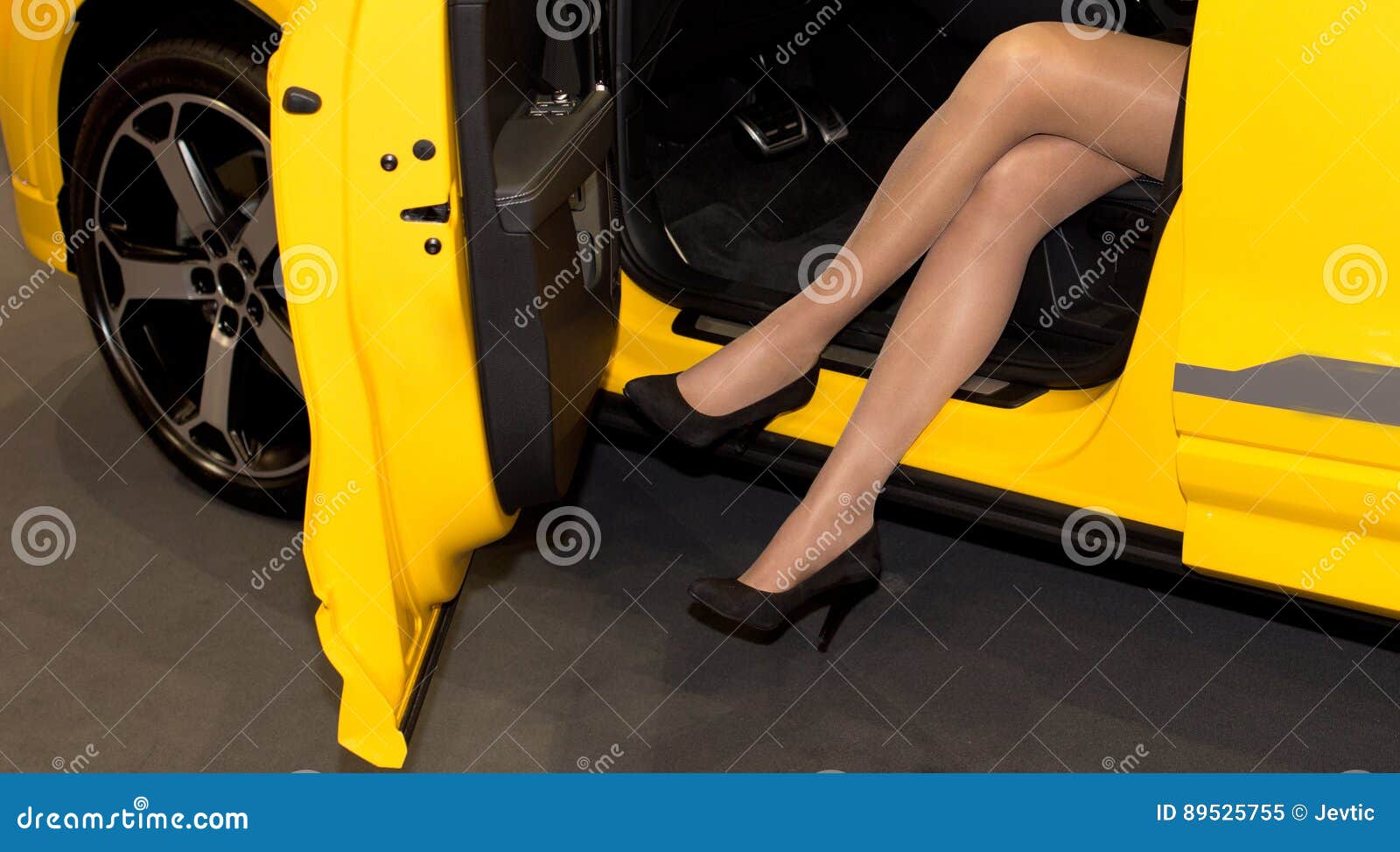 Legs of girl in car stock image. Image of attractive - 89525755