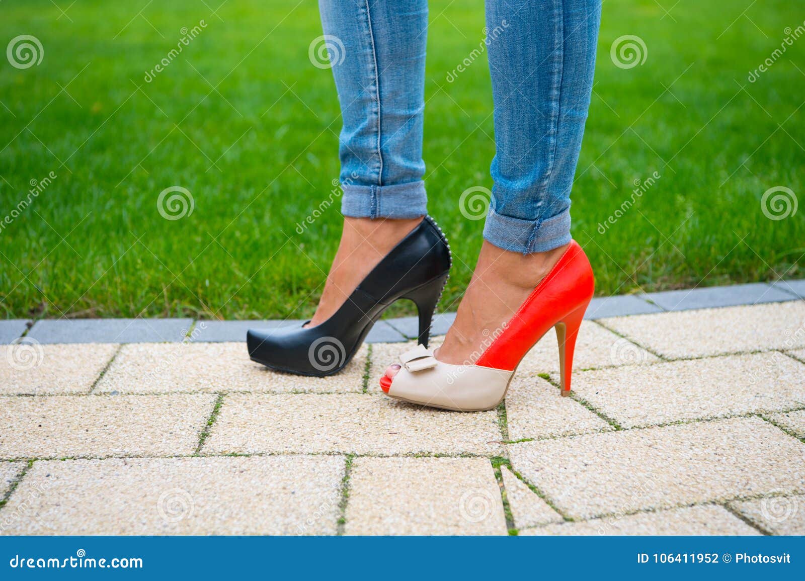 Legs in Shoes and Jeans on Green Grass Background Stock Photo - Image ...