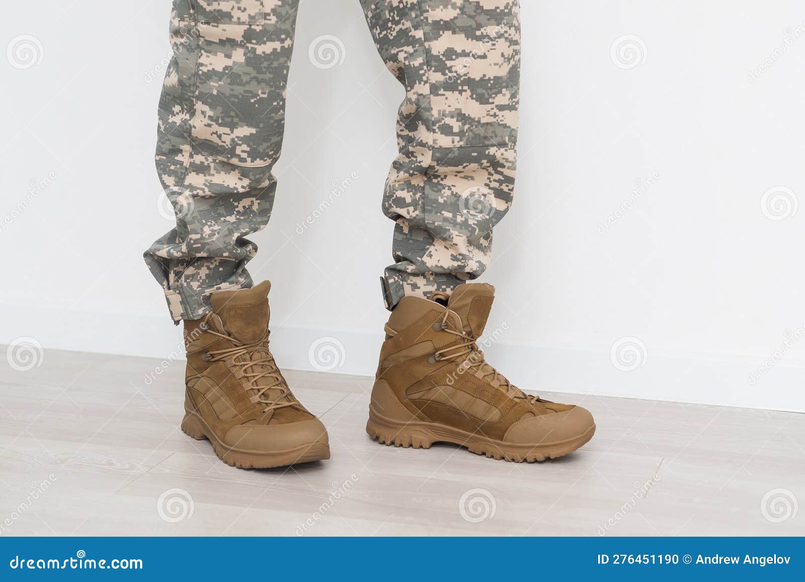 Legs of a soldier in shoes stock photo. Image of bootlaces 276451190