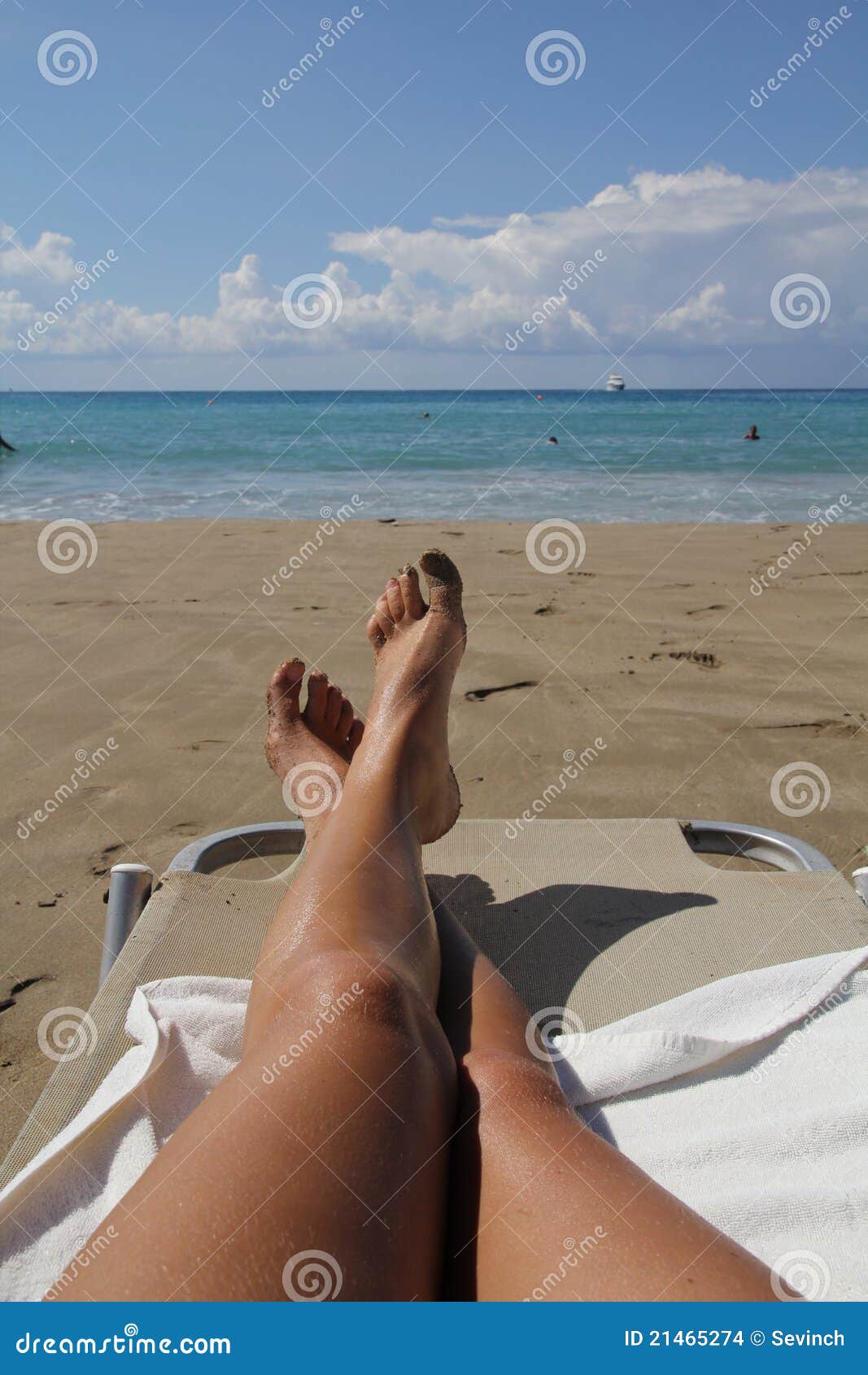 Legs on the sunbed stock photo. Image of coast, paradise 21465274