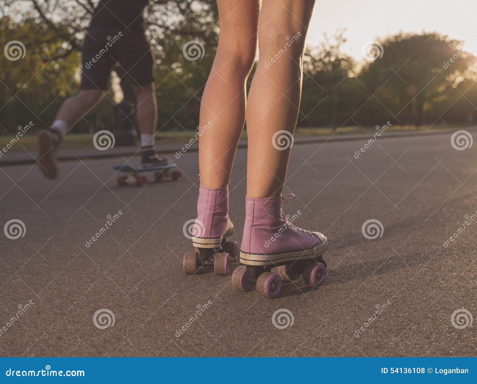 Legs of Young Woman Roller Skating in Park Stock Photo Image of outdoor, female 54136108