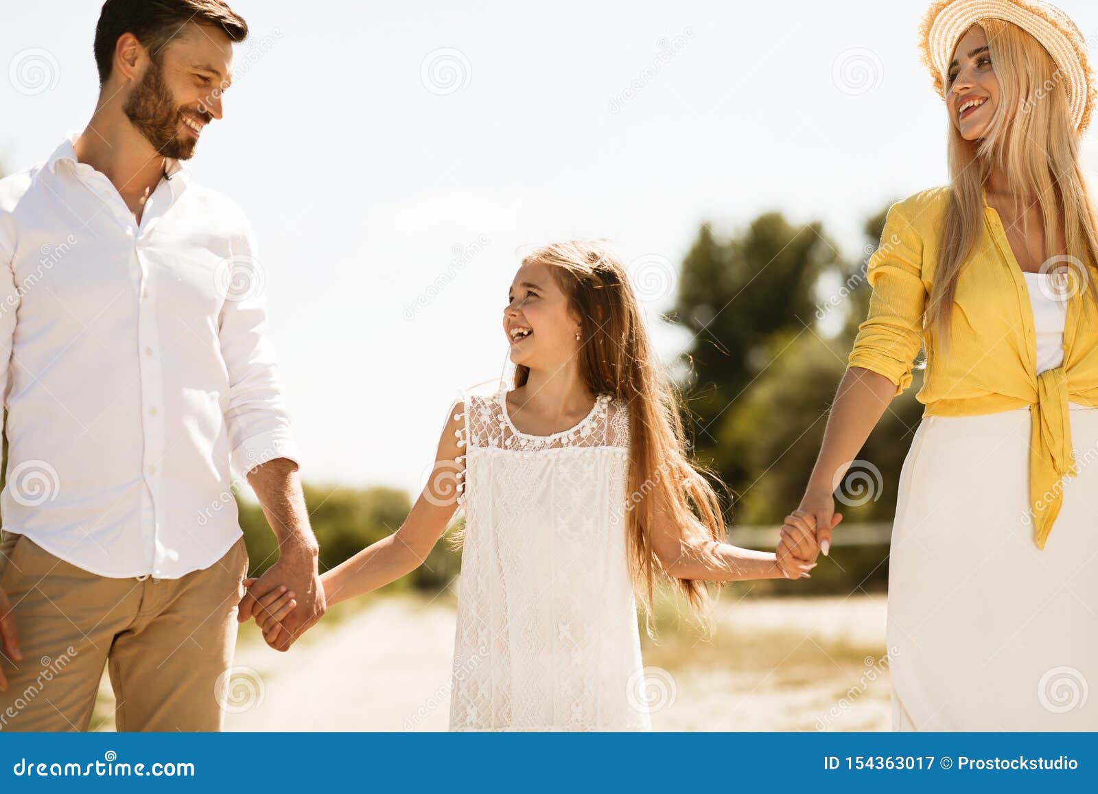 Parents And Child Walking Holding Hands Outdoors Stock Image Image Of Father Countryside