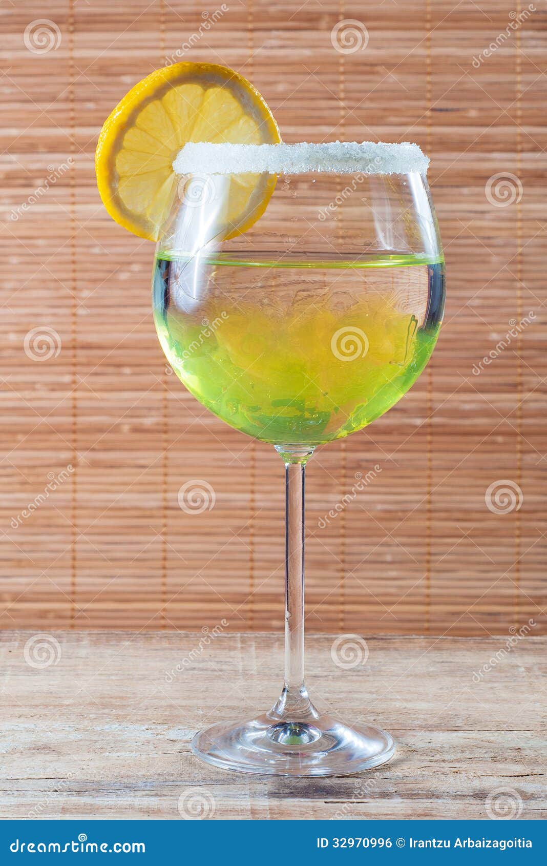 Lemon cocktail in a glass stock photo. Image of wood 32970996