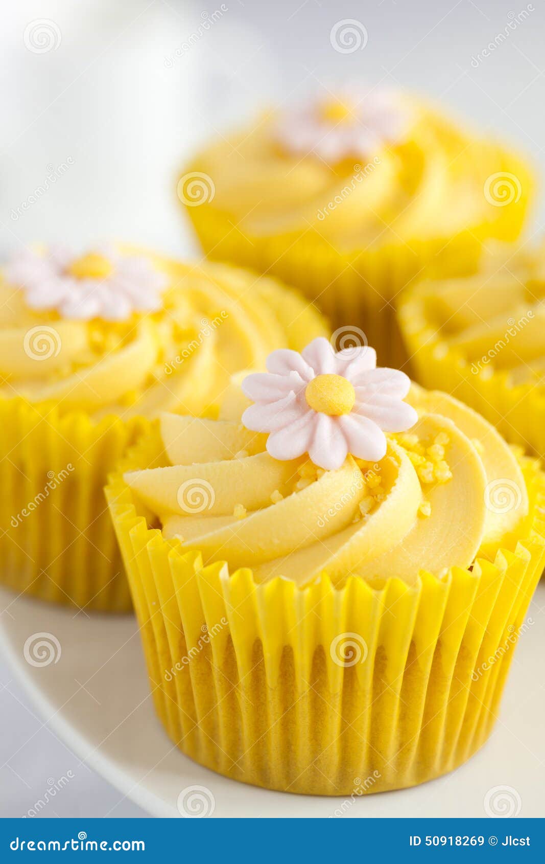 Lemon Cupcakes With Butter Cream Swirl And Fondant Flower ...