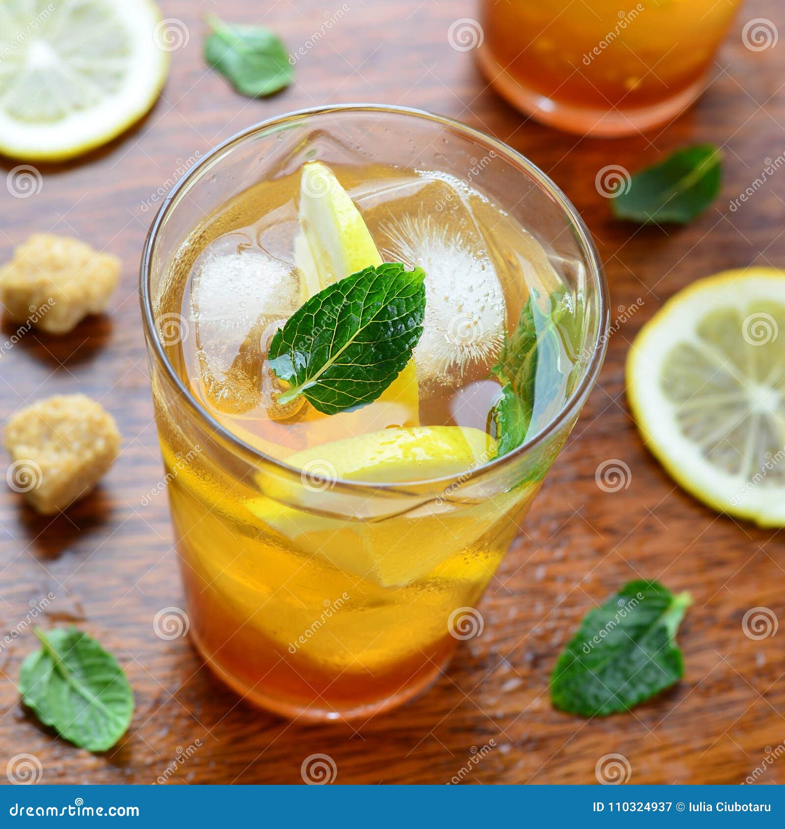 Lemon iced tea with mint stock image. Image of juice 110324937