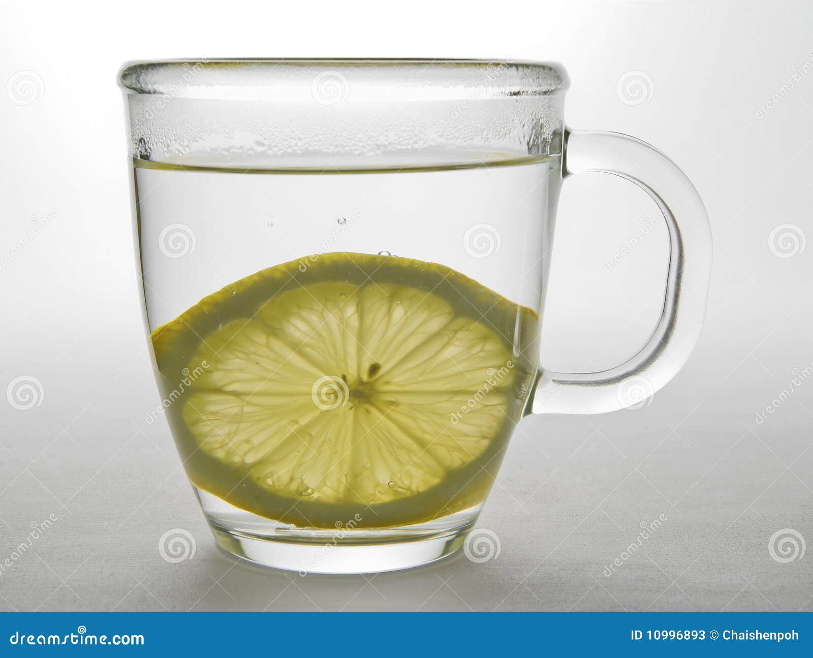 Lemon Slice in Glass Mug 2 stock image. Image of royalty 10996893