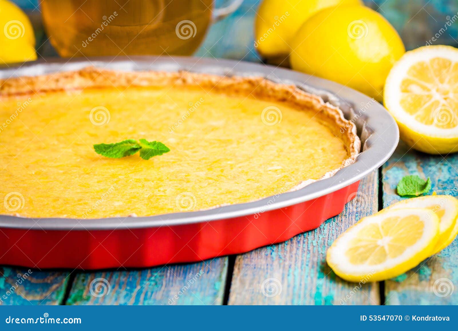 Lemon tart in baking dish stock photo. Image of cream 53547070
