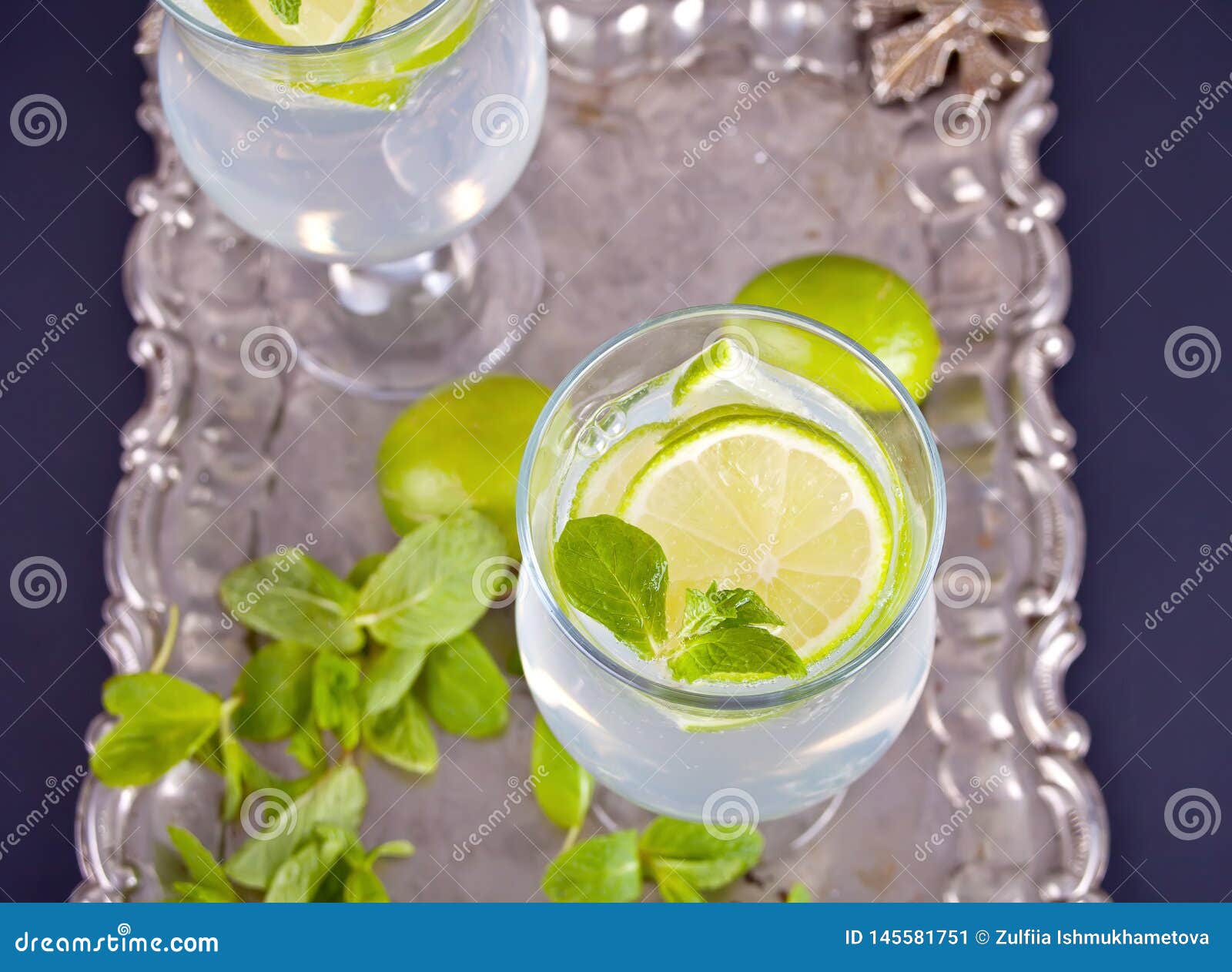 Lemonade or Mojito Cocktail with Lemon and Mint, Cold Refreshing Drink
