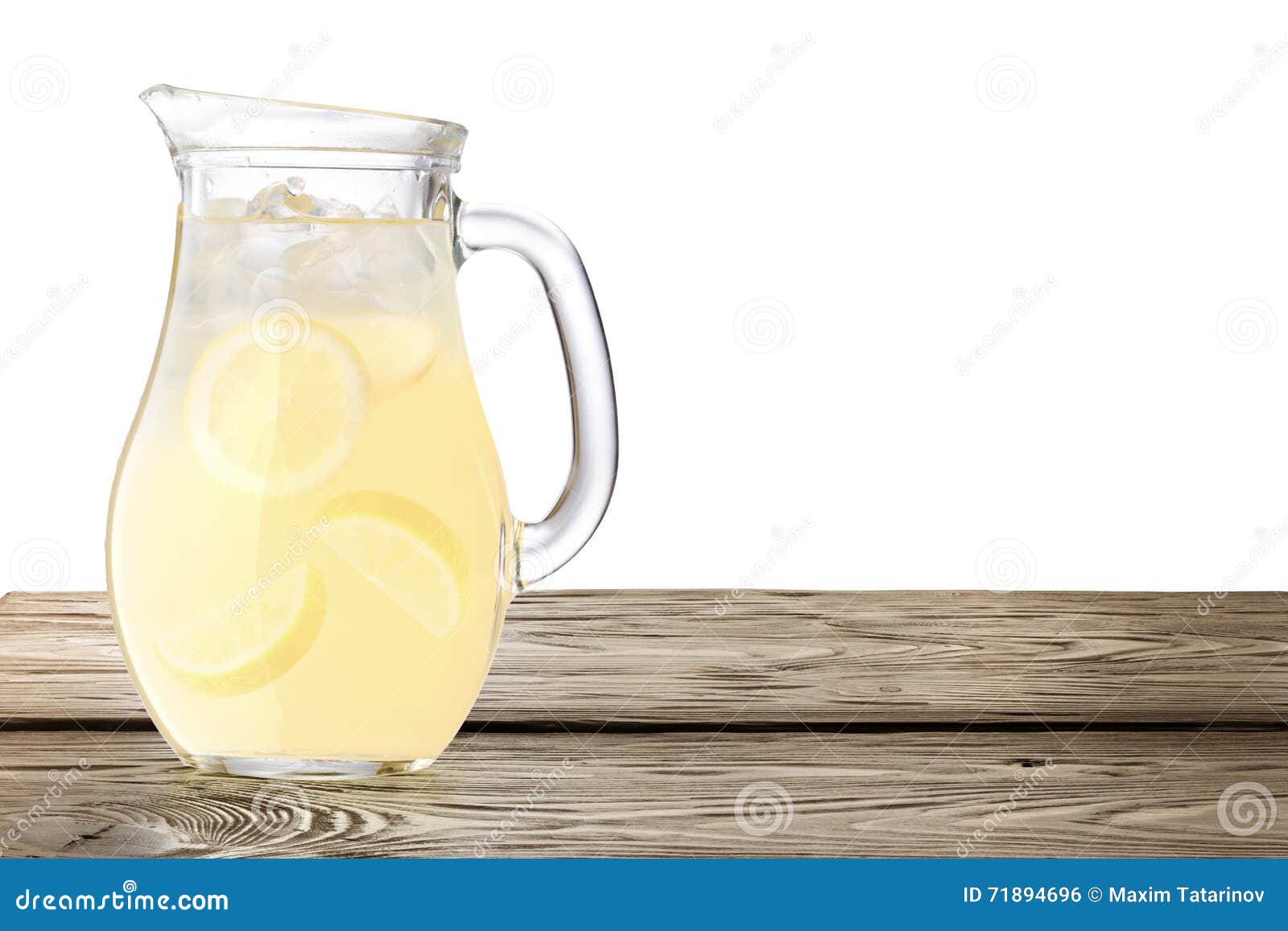 lemonade pitcher on wooden table