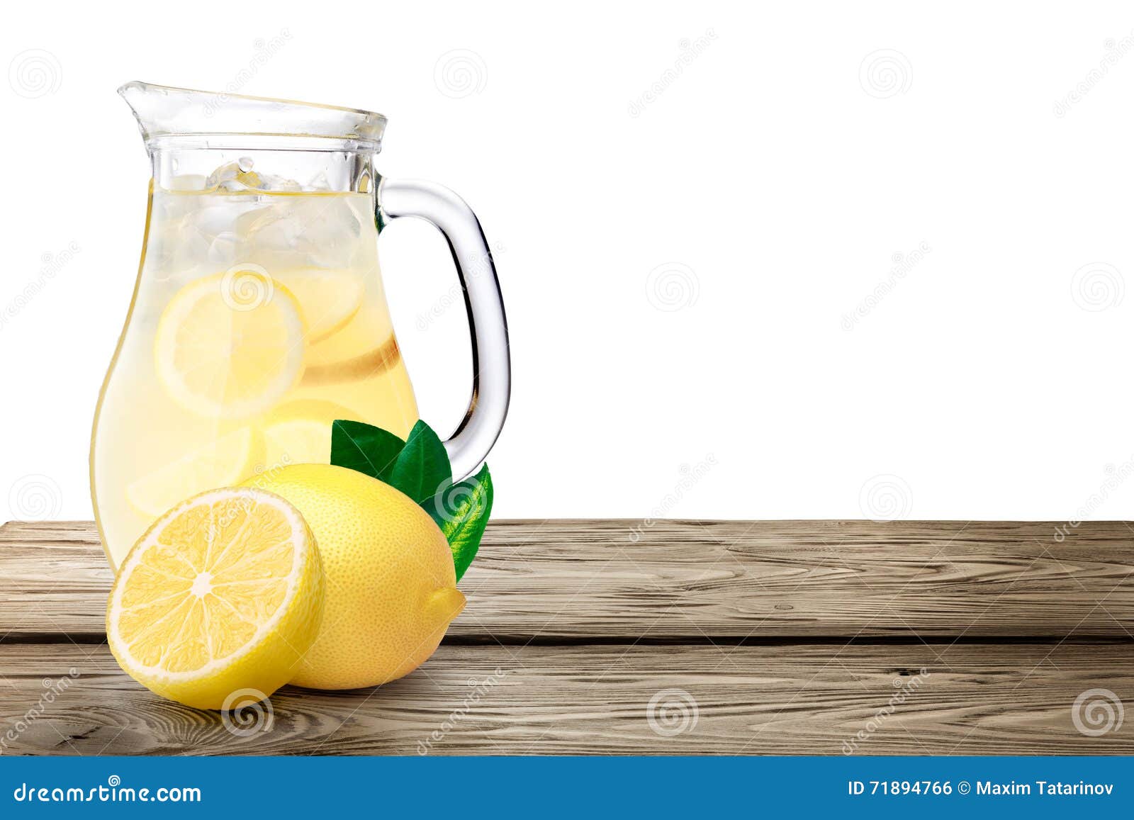 lemonade pitcher on wooden table
